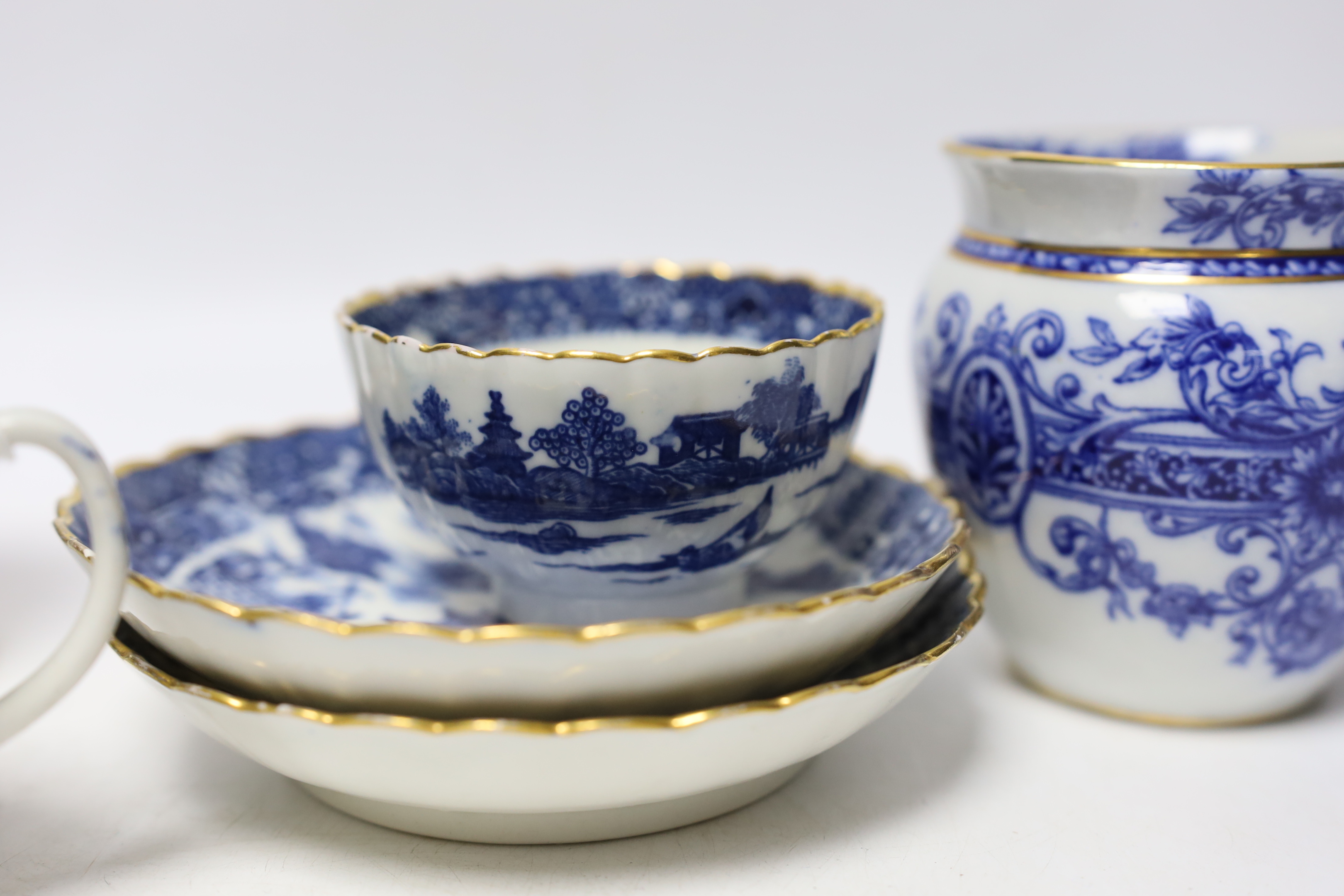 Liverpool, Seth Pennington and John Part, a Porter and Ferryman pattern coffee can, c.1780, together with an early 19th century Pearlware blue and white mug and further blue and white wares (5)